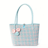 Handwoven pastel pink and blue PE rattan tote bag with floral details.