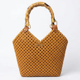 Handwoven PE rattan tote bag with a natural bamboo handle in warm caramel brown.