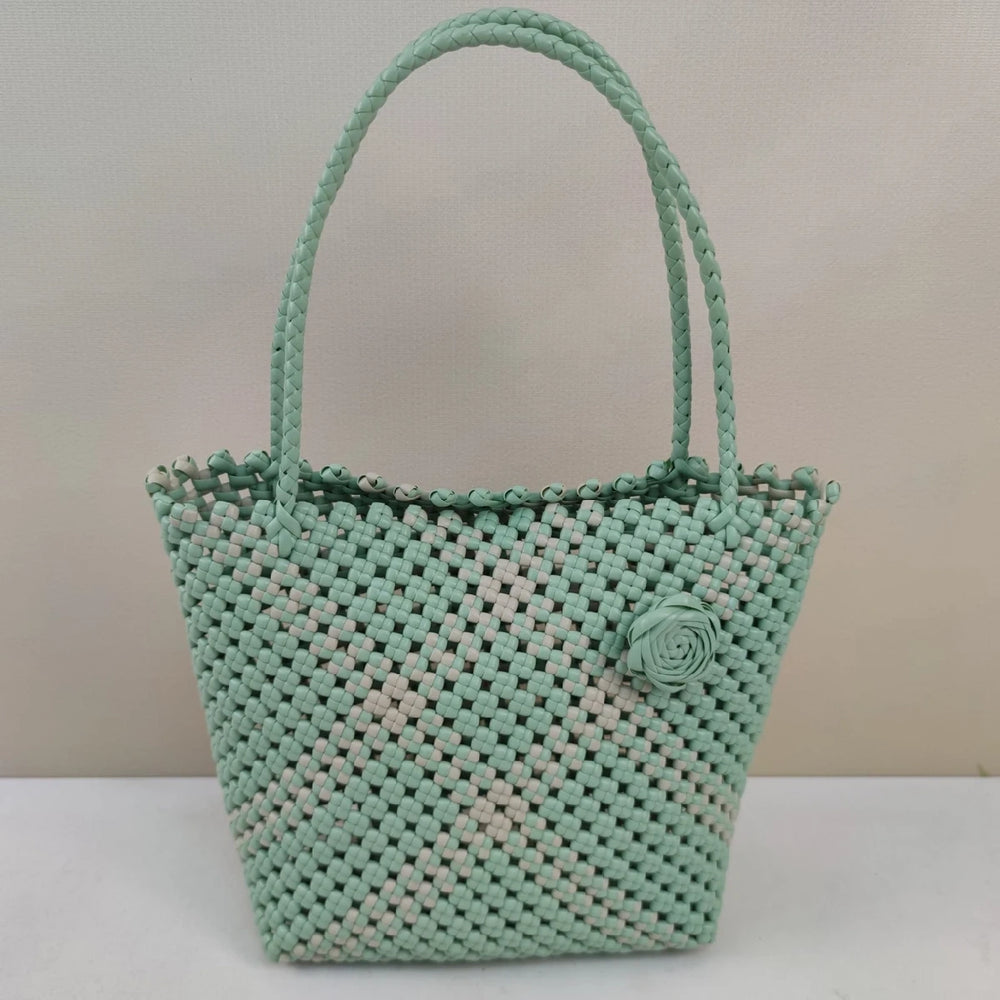 Limited edition handmade PE rattan bag crafted by artisans.