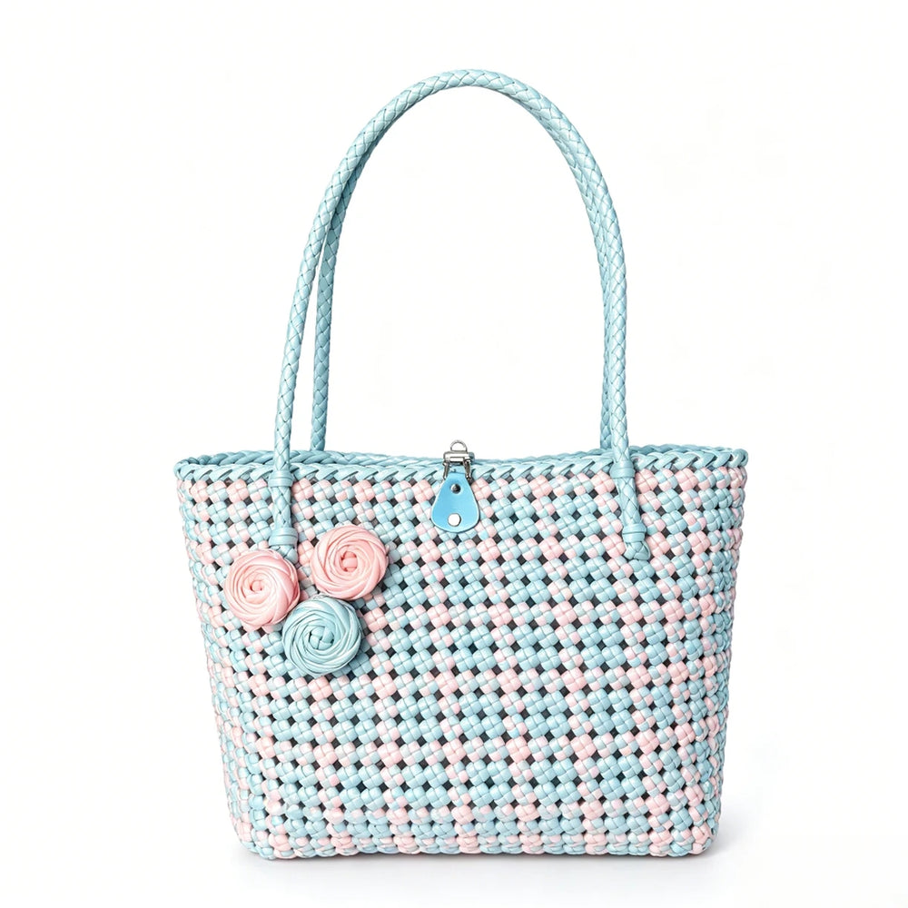 Handwoven pastel pink and blue PE rattan tote bag with floral details.