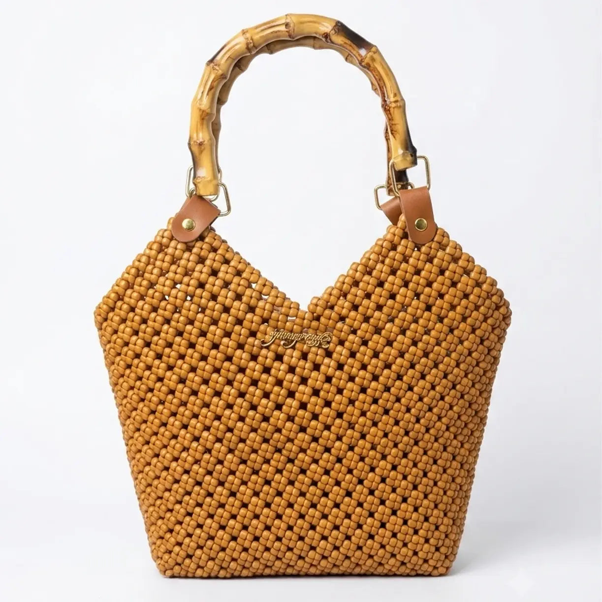 Handwoven PE rattan tote bag with a natural bamboo handle in warm caramel brown.