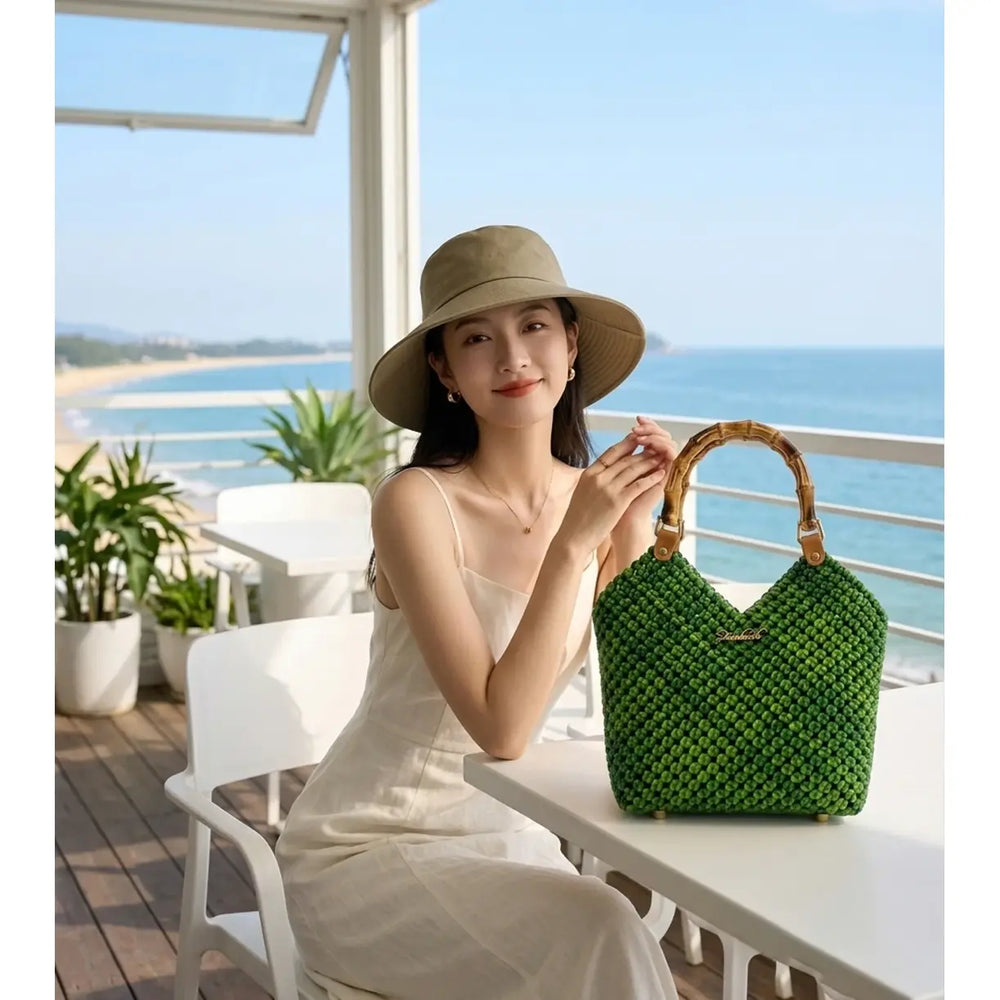 Handmade PE rattan tote bag styled for everyday and casual use.