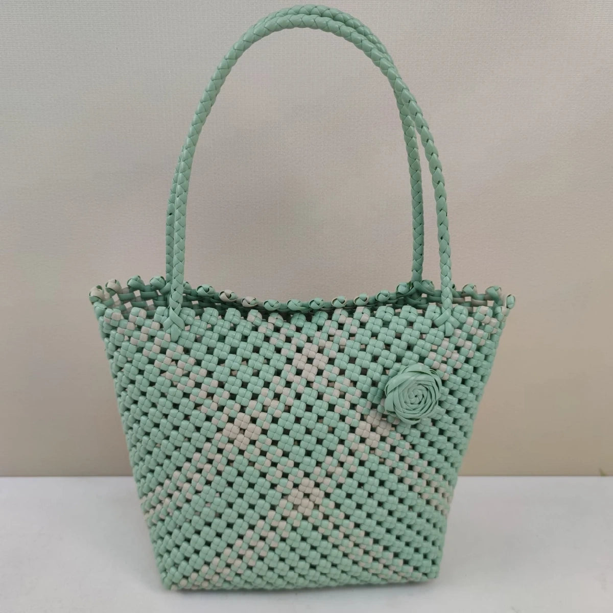 Limited edition handmade PE rattan bag crafted by artisans.