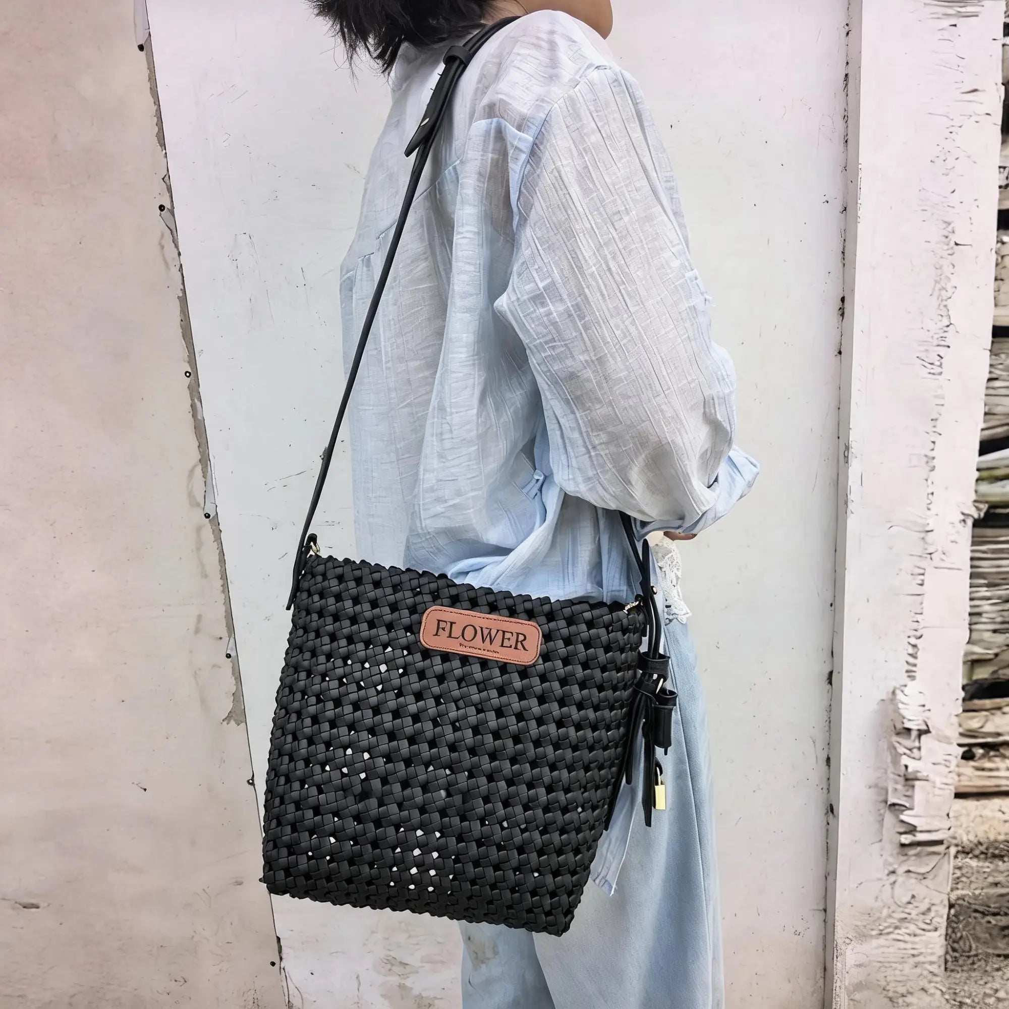 Handmade bag created with soft PU leather weaving strips.