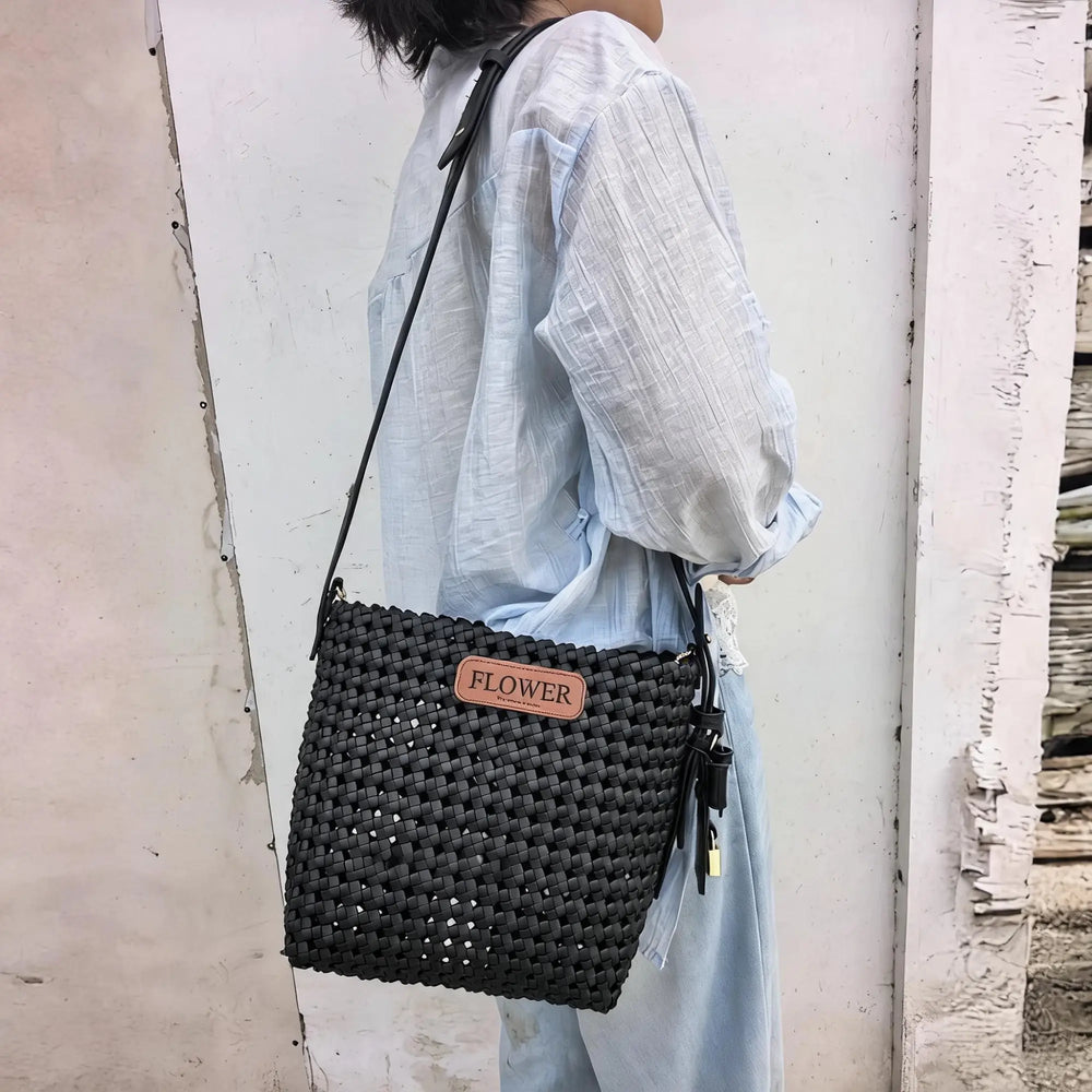 Handmade bag created with soft PU leather weaving strips.